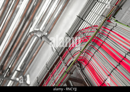 bright wires and chrome pipes. industrial background Stock Photo
