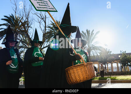 Valencia, Spain - February 16, 2019: People disguised as bad witches during a protest. Stock Photo