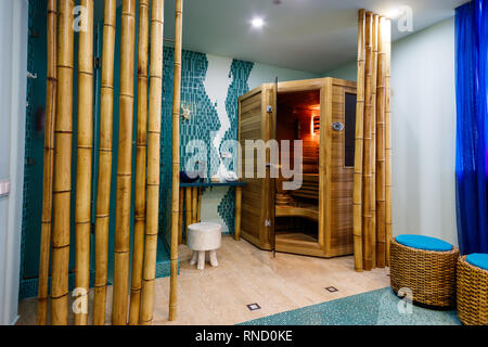 Small wooden sauna cabin in a spa salon. Stock Photo