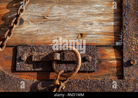 Rusty metal on old door Stock Photo