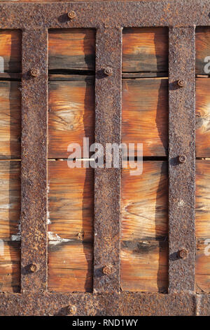 Rusty metal on old door Stock Photo