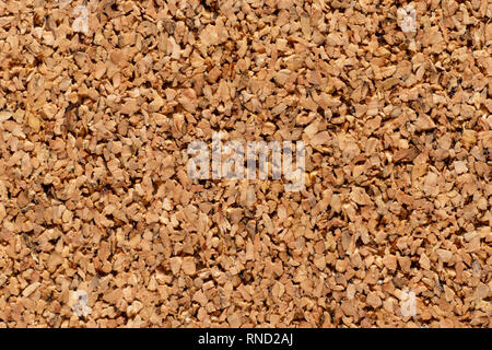 Pressed corkwood sawdust for background, macro shot Stock Photo