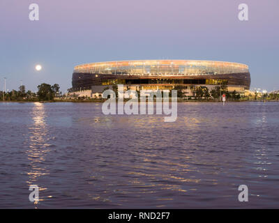 Moon rising over Perth Optus Stadium, Perth, Western Australia Stock Photo