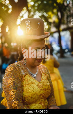 Valencia, Spain - February 16, 2019: Aymara woman wearing traditional rural Bolivia dress with hat during a parade. Stock Photo