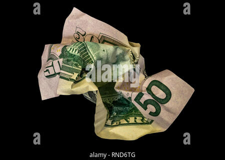 Crumpled fifty dollar bill isolated on black background Stock Photo