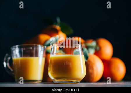 Orange juice on table Stock Photo