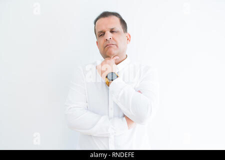 Middle age man thinking clueless about a question Stock Photo