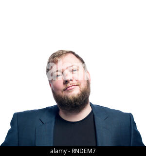 Close-up portrait of a brooding bearded man. Blue jacket in business look. Isolated on white background Stock Photo