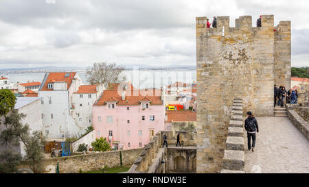 Lisbon, Portugal - March 4, 2016: Tourists waqlking around on Castelo de San Jorge (Saint George) in Lisbon, Portugal Stock Photo