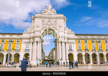 LiSBON, PORTUGAL - March 5, 2016: Man admiring the famous Praca do Comercio showing Viriatus, Vasco da Gama, Pombal and Nuno Alvares Pereira Stock Photo