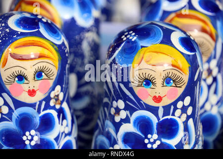 Russian nesting dolls in the souvenir shop. Traditional wooden matryoshka dolls Stock Photo