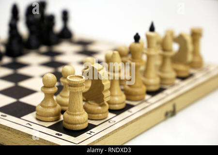 Chess board with wooden chess pieces, selective focus. Concept for competition, strategy or business success Stock Photo