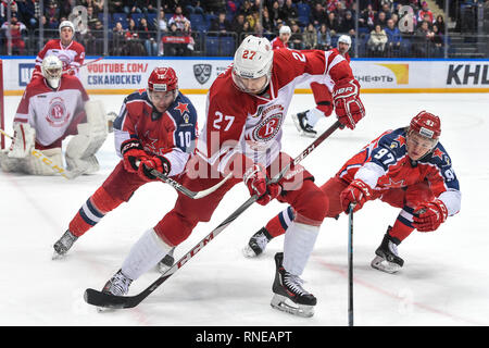 Moscow. 18th Feb, 2019. Vojtech Mozik (C) of Vityaz vies with Sergey Tolchinsky (L) and Kirill Kaprizov (R) during the 2018-2019 KHL game between CSKA Moscow and Vityaz Podolsk in Moscow, Russia on Feb. 18, 2019. CSKA won 6-1. Credit: Evgeny Sinitsyn/Xinhua/Alamy Live News Stock Photo