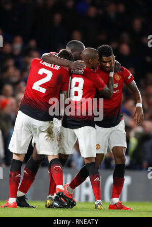 London, UK. 18th Feb, 2019. Manchester United's players celebrate the goal by Paul Pogba during the FA Cup fifth round match between Chelsea and Manchester United in London, Britain on Feb. 18, 2019. Manchester United won 2-0. FOR EDITORIAL USE ONLY. NOT FOR SALE FOR MARKETING OR ADVERTISING CAMPAIGNS. NO USE WITH UNAUTHORIZED AUDIO, VIDEO, DATA, FIXTURE LISTS, CLUB/LEAGUE LOGOS OR 'LIVE' SERVICES. ONLINE IN-MATCH USE LIMITED TO 45 IMAGES, NO VIDEO EMULATION. NO USE IN BETTING, GAMES OR SINGLE CLUB/LEAGUE/PLAYER PUBLICATIONS. Credit: Han Yan/Xinhua/Alamy Live News Stock Photo