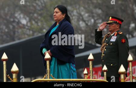 Kathmandu, Nepal. 19th Feb, 2019. Nepal's President Bidhya Devi Bhandari (L) attends the National Democracy Day celebration at Tundikhel in Kathmandu, Nepal, on Feb. 19, 2019. Nepal's 69th National Democracy Day was observed on Tuesday with various programs to commemorate the day when the nation achieved freedom from the Rana regime. Credit: Sunil Sharma/Xinhua/Alamy Live News Stock Photo