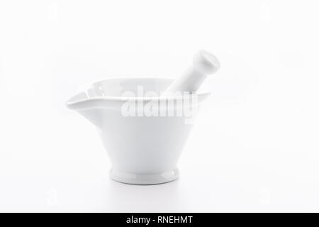 White mortar and pestles isolated on white background. Stock Photo