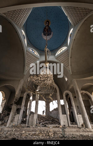 St. Ephrem Cathedral in Mossul, like many other churches, was blown up by the IS. The Christian population was expelled by the IS, but many return to their homes in the surrounding Christian villages. Some churches could be rebuilt, so that church services can take place there again. Nevertheless the Christians are now threatened by the Shiite conquerors of the province Ninawa and the capital Mossul and more and more repressed, so that the Christians do not have good perspectives for a living in their cities. Stock Photo