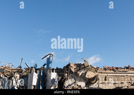 Ruined part of the wall in the blue sky Stock Photo