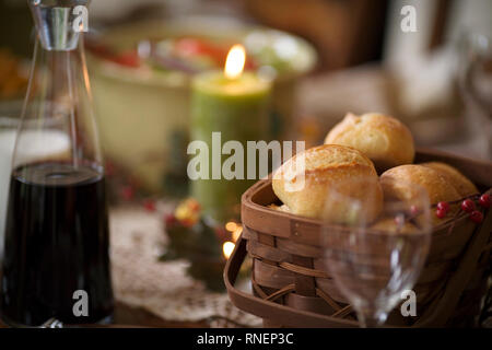 Bread rolls in a wooden basket. Stock Photo
