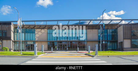 Ed Roberts Campus, Berkeley, California, USA. Daytime, color, landscape photo of campus in early afternoon light, one white cloud in blue sky. Stock Photo