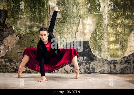 Ballerina  on pointe make stretching against old wall  ,istanbul Stock Photo