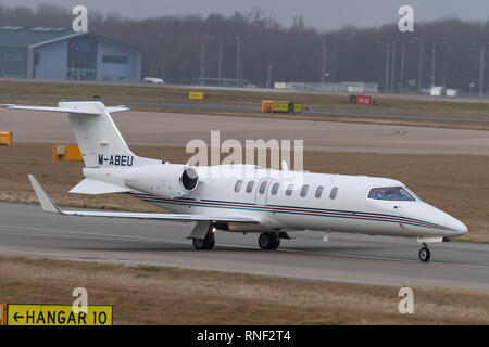 Stansted Airport commercial aircraft, Ryanair Learjet 45 M-ABEU Stock Photo