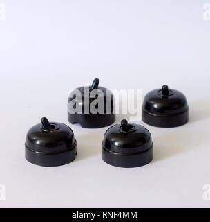 Old black bakelite switches Stock Photo