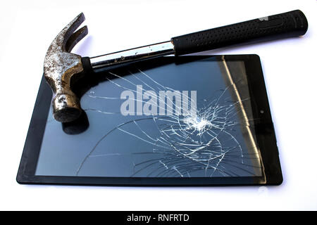 Broken Smart Phone Tablet Mobile Device With hammer on White Background Stock Photo