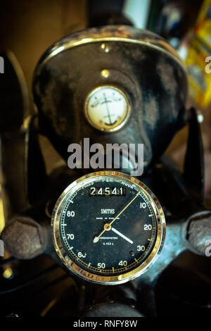 Interior view of local motorcycle workshop garage full of various motorbikes and spare parts under repair Stock Photo