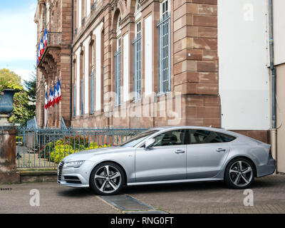 Strasbourg, France - Oct 1, 2017: Side view of silver luxury Audi vehicle parked in an upper-class neighbourhood in Strasbourg, France in Place Broglie near city hall Stock Photo