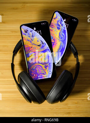 https://l450v.alamy.com/450v/rng69b/paris-france-oct-2-2018-comparing-the-new-latest-iphone-xs-and-xs-max-smartphones-telephones-after-the-unboxing-with-beats-studio-3-professional-headphones-rng69b.jpg