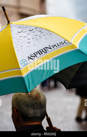 STRASBOURG, FRANCE - MAR 22, 2018: CGT General Confederation of Labour workers with placard at demonstration protest against Macron French government string of reforms - man with Aspirin Plus c umbrella Stock Photo