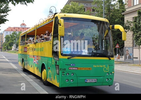 Vienna, Austria - July 12, 2015: Vienna Sightseeing Bus With Tourists in Vienna, Austria. Stock Photo