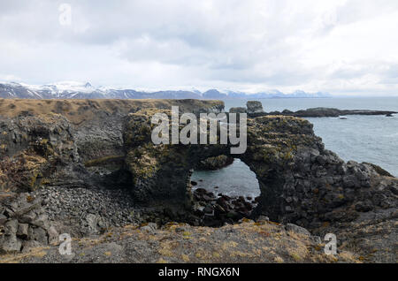 Beautiful iconic arch rock along the coast of Arnarstapi Iceland. Stock Photo