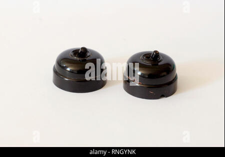 Two black bakelite vintage switches Stock Photo