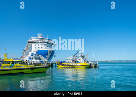 MOUNT MAUNGANUI NEW ZEALAND - FEBRUARY 10 2019:  Port of Tauranga two pilot boats and large cruise liner Majestic Princess berthed at Mount Maunganui  Stock Photo