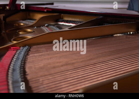 piano harp with its twisted strings, interior of a piano Stock Photo
