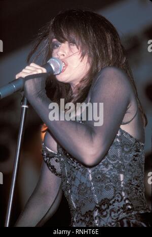 Singer Christina Amphlett of the Divinyls is shown performing at the