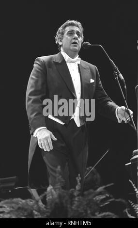 Spanish-Mexican operatic tenor Plácido Domingo is shown singing during a concert performance. Stock Photo