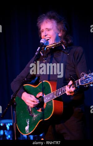 Scottish singer, songwriter and guitarist Donovan, born Donovan Philips Leitch, is shown performing on stage during a 'live' concert appearance. Stock Photo