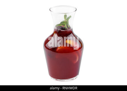 Cocktail in a glass carafe with blackberries and lime and sweet syrup. Soft drink isolated on white background. Side view. Stock Photo