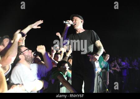 Singer Al Barr is shown performing onstage during a live concert  appearance with the Dropkick Murphys Stock Photo - Alamy