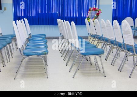 empty row chairs in prepare seminar a meeting room, Select focus with shallow depth of field. Stock Photo