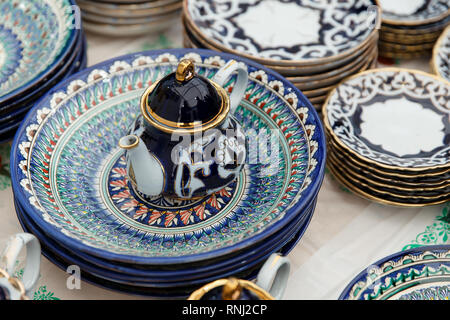 Ethnic Uzbek ceramic tableware. Decorative ceramic plate