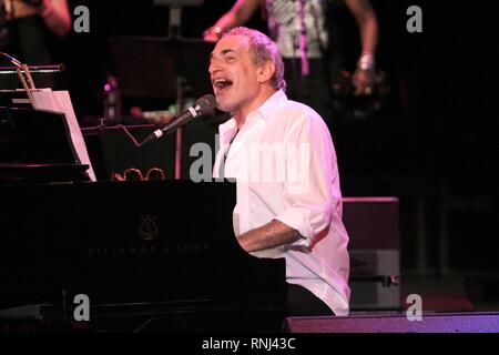 Musician Donald Fagen of the Dukes of September is shown performing on stage during a 'live' concert appearance. Stock Photo