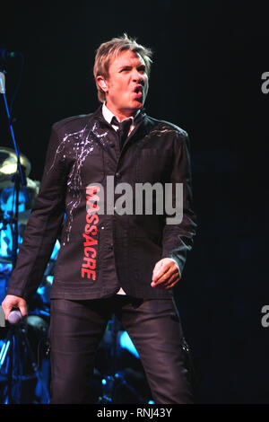 Duran Duran singer Simon LeBon is shown performing on stage during a 'live' concert appearance Stock Photo