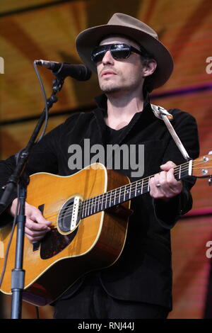 Gold microphone on stage during the concert Stock Photo - Alamy