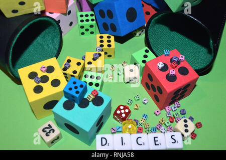Dices and letters on the table.Rolling the dice concept for business risk chance good luck or gambling..... Stock Photo