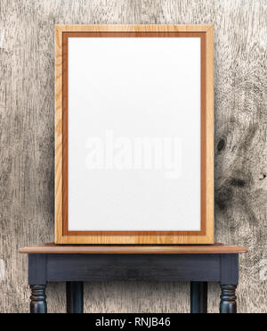 Black picture frame leaning on a yellow wall. Blank mockup template ...
