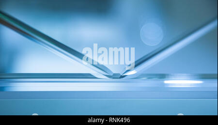 Glass, mirror reflection shapes and shadows. Close-up details.   Stock Photo